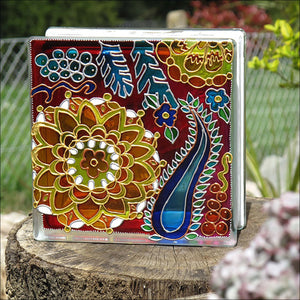 This stained glass block suncatcher looks great in a garden! Folk Art flowers, berries & leaves in golds & blues on rich red