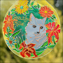 Stain glass pet memorial painted with a grey cat, a ring of colourful flowers & personalized with the words Beautiful Millie