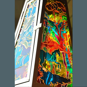 An extraordinarily colourful stained glass candle lantern by Ornately Lanterns shows a unicorn against a fantasy background
