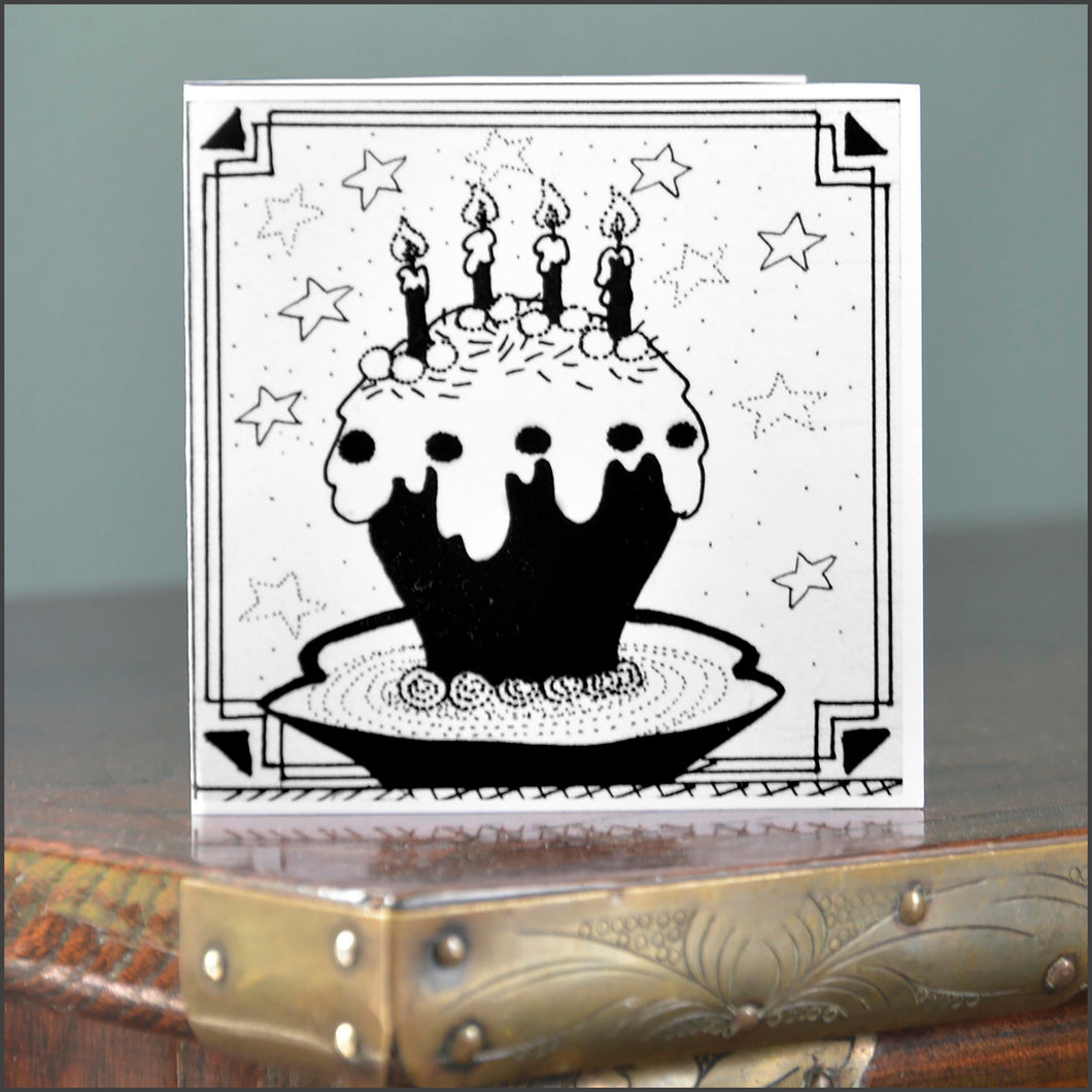 A small square black and white illustration gift card for Christmas & birthday celebrations with an elegant cake and candles