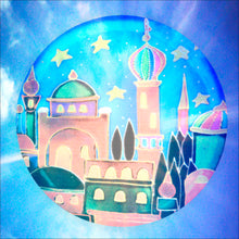 Colourful window cling decal against a blue sky patterned with an Arabian city of towers and domes against a starry night sky