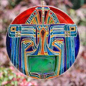 Dramatic stained glass hanging suncatcher painted with a blue gold green Egyptian, Peruvian, Aztec, or even Art Deco, design